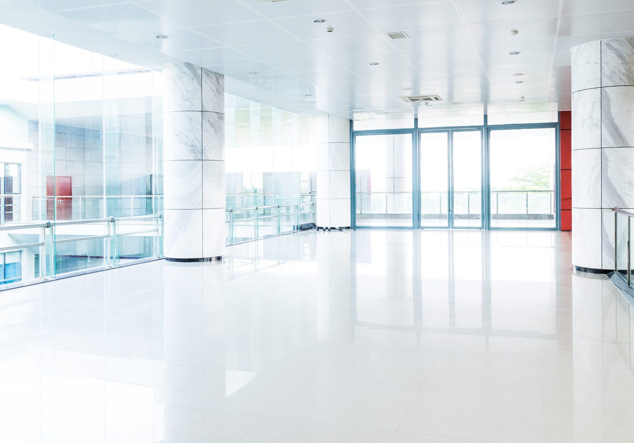 Empty long corridor in modern office building.